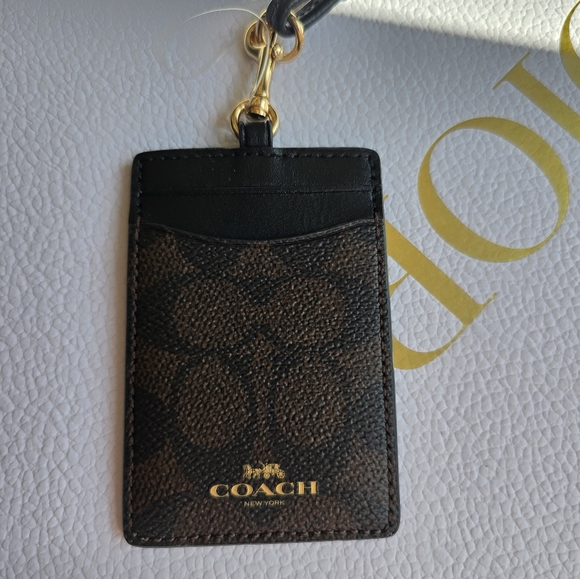 Coach Accessories - ‼️SOLD‼️ NWT Coach Signature Brown and Black Lanyard